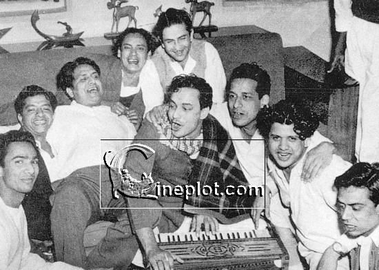 The magic team (left to right) Dattaram, Om Prakash Mehra, Shankar, Hasrat Jaipuri, Raj Kapoor, Mukesh (at the harmonium), Raja Nawathe, Jaikishen and Shailendra